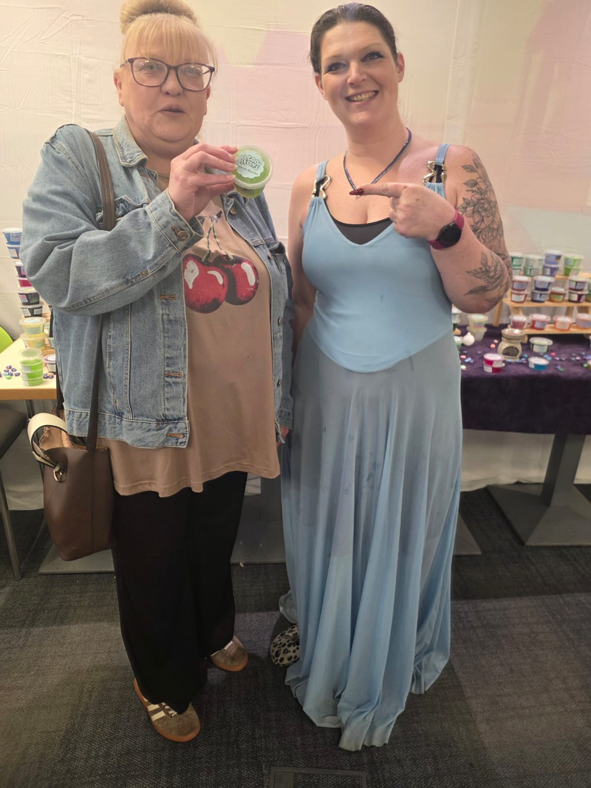 A happy customer holding an LL Cool Jellys jelly wax melt pot with Lisa
